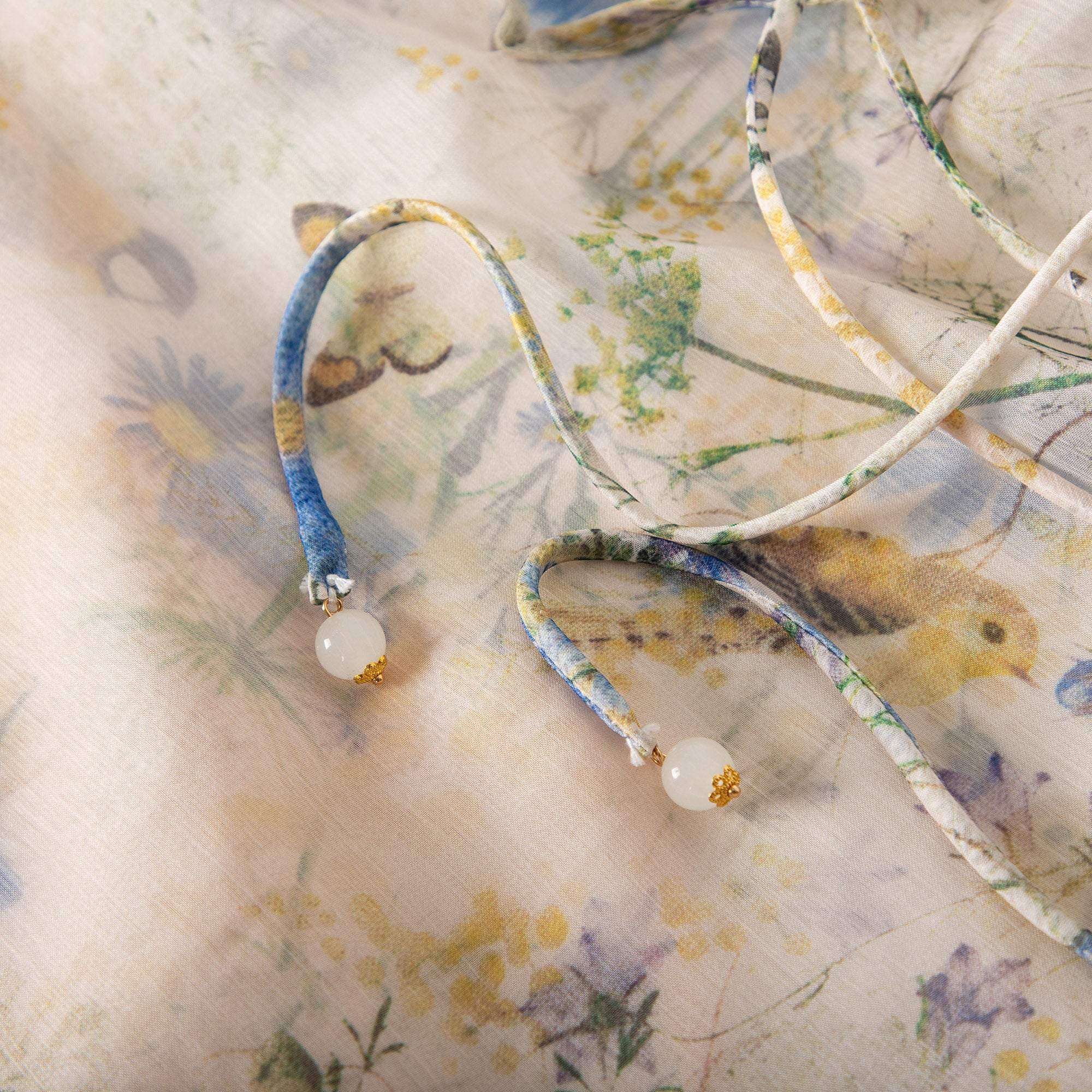 WZUA1081-Sheer Floral Tie-Neck Blouse